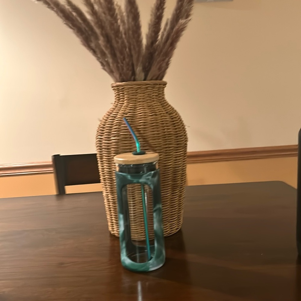 Glass water bottle.